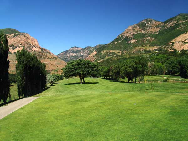 El Monte Golf Course with trees and mountains